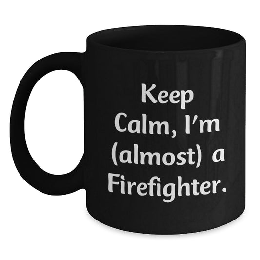 Funny Firefighter Christmas Unique Gifts from Friends and Family, Black Coffee Mug, 'Keep Calm, I'm (almost) A Firefighter.' - Main