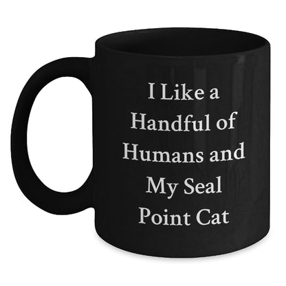 Funny Seal Point Cat Christmas Unique Gifts from Men to Seal Point Cat Lovers Friends Family Friends with Black Coffee Mug I Like A Handful Of Humans And My Seal Point Cat - Main