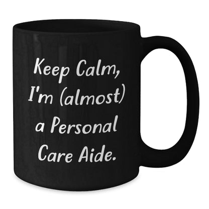 Funny Personal Care Aide Gifts from Friends to Family for Graduation - 'Keep Calm, I'm (almost) A Personal Care Aide.' Black Coffee Mug - Additional
