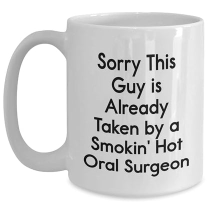 Funny Oral Surgeon Gifts from Friends - Sorry, This Guy is Already Taken by a Smokin' Hot Oral Surgeon White Ceramic Coffee Mug - Mallard Moon Gift Shop