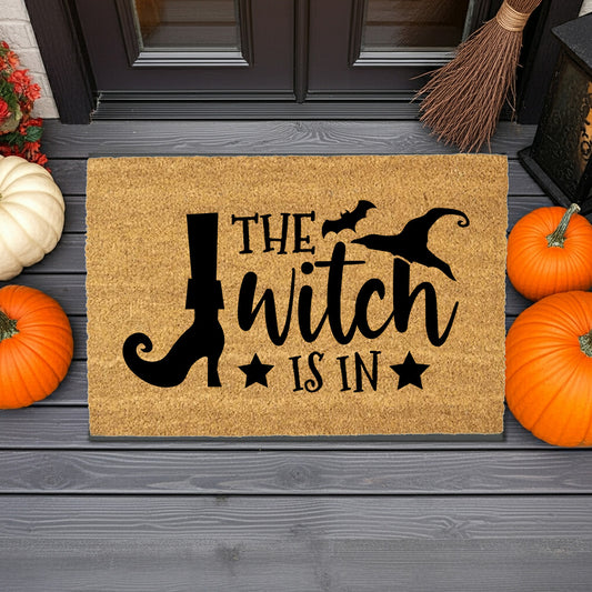 The Witch Is In Doormat – Funny Witch Halloween Outdoor Coir Mat Décor - Mallard Moon