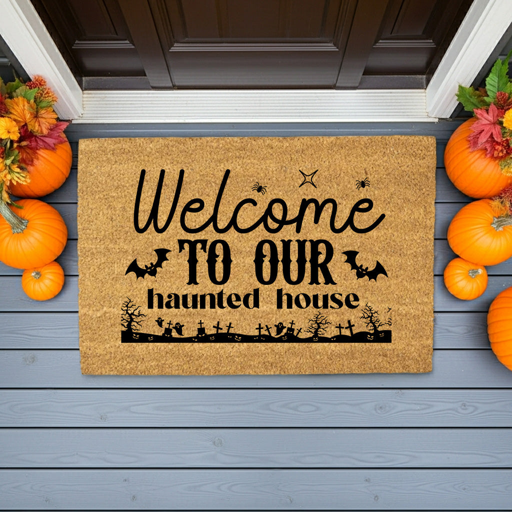 Welcome to Our Haunted House Coir Doormat – Spooky Halloween Welcome Mat | Rustic Haunted Porch Decor | Funny Fall Entryway Rug - Mallard Moon