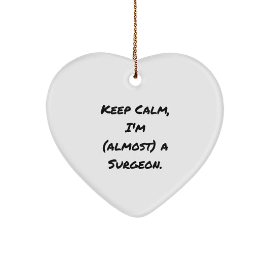 Funny Surgeon Gifts: Keep Calm, I'm (almost) A Surgeon. Heart Ornament for Men, Women, Coworkers, Friends, Family, Christmas Unique Gifts - Image 1