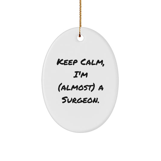 Funny Surgeon Gifts for Men, 'Keep Calm, I'm (almost) A Surgeon.' Oval Ornament, Holiday Gifts from Friends, Christmas Unique Gifts for Surgeons - Image 1